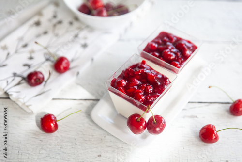 Creamy panna cotta with cherry sauce