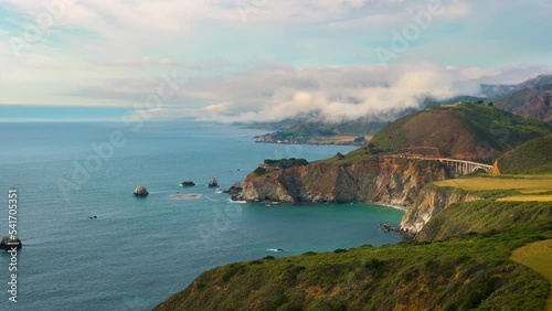 Pan right of pacific coast and Bixby Bridge near Big Sur in California, USA