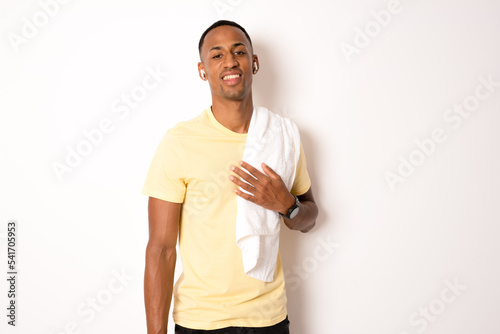 Portrait of a athletic man after doing exercises, isolated over a white background