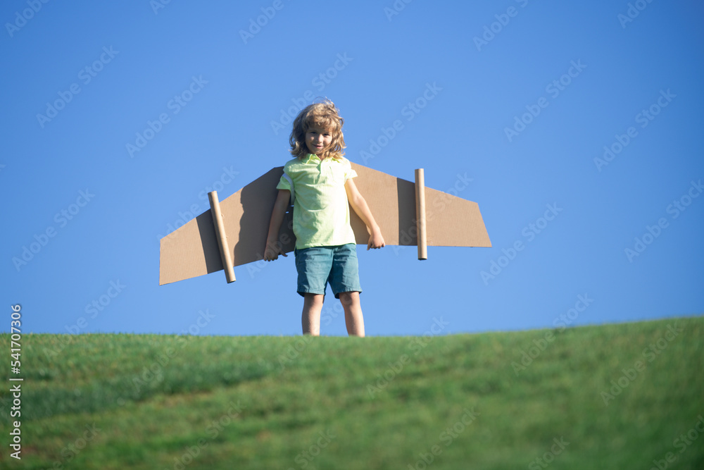 Child boy playing pilot on the sky blue background. Kid dreaming. Child ...
