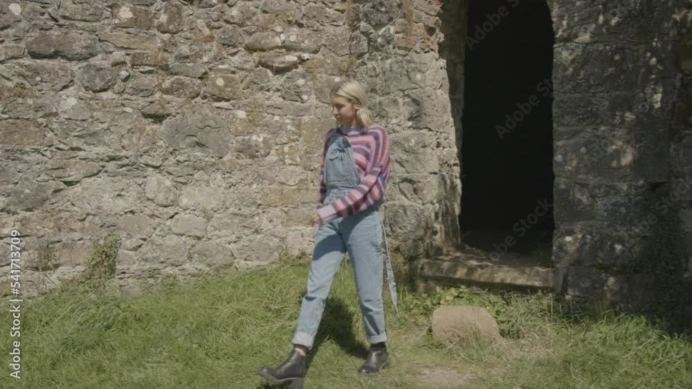 Tracking shot of tourist sightseeing ruins of Crom Castle / Enniskillen, Northern Ireland Tracking shot of tourist sightseeing ruins of Crom Castle / Enniskillen, Northern Ireland