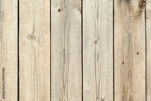 Bright wooden planks texture background with nail holes and knots