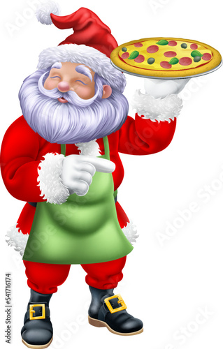 A Christmas Santa Claus father Christmas cartoon food chef holding a silver platter tray with a pizza photo