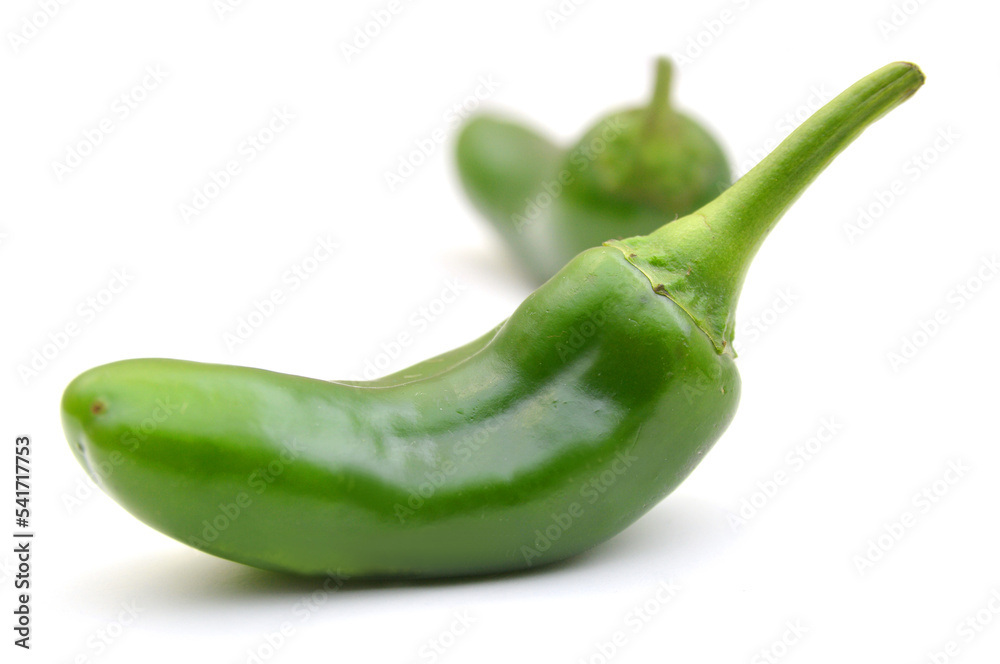 Green chilies (jalapeno) on white background Green chilies (jalapeno) on white background