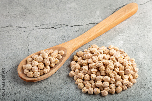Pile of raw chickpeas on the table.