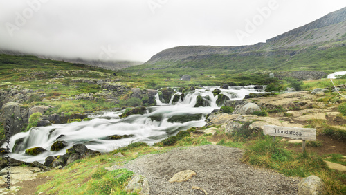 Hundafoss, one of the 5 waterfalls below Dynjandi waterfall located in Arnarfjordur, Iceland. It is the largest waterfall in the Westfjords and has a total height of 100 metres. photo