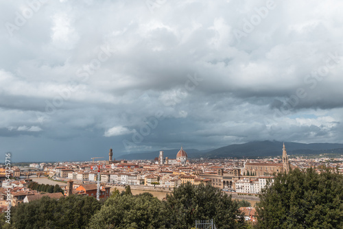 Amazing old town with vintage houses and cathedrals on a cloudy day with clouds in Florence, Italy