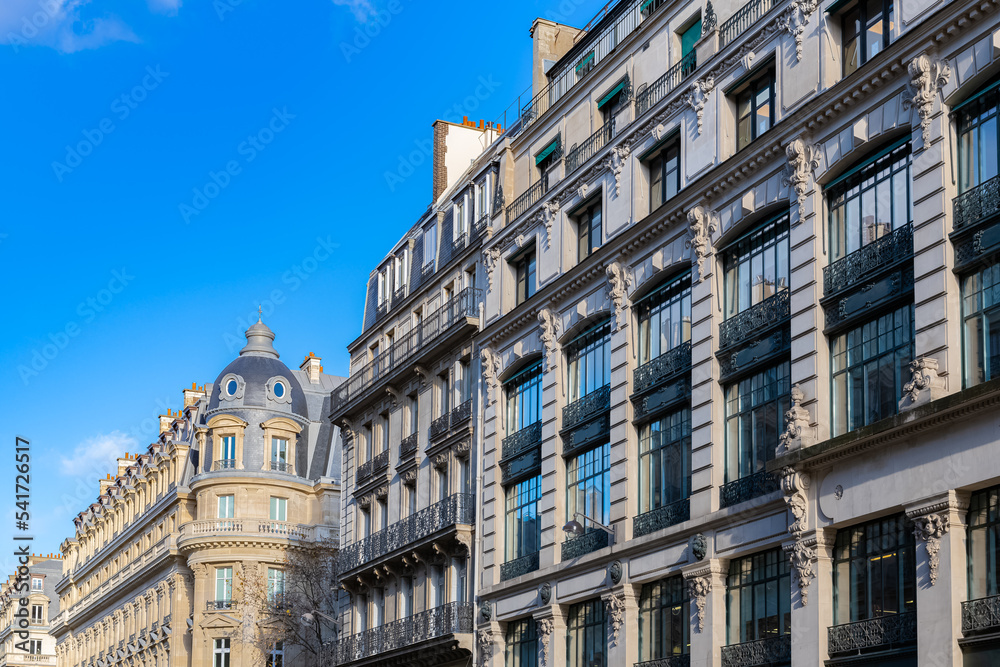 Paris, beautiful building, ancient facade rue du Louvre
