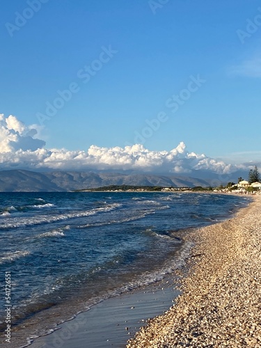 stormy sea in Acharavi, small resrt in Corfu island, Greece with Albania mountains in a distance