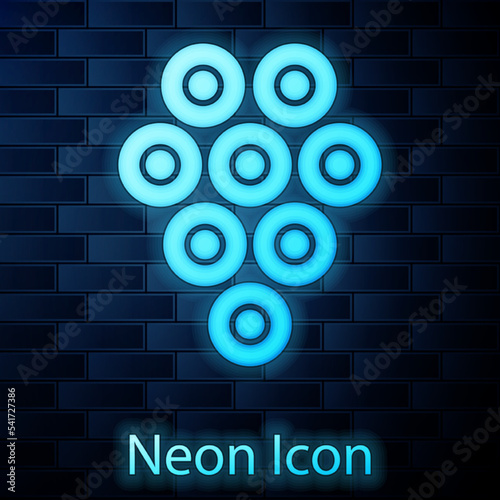 Glowing neon Caviar icon isolated on brick wall background. Vector.