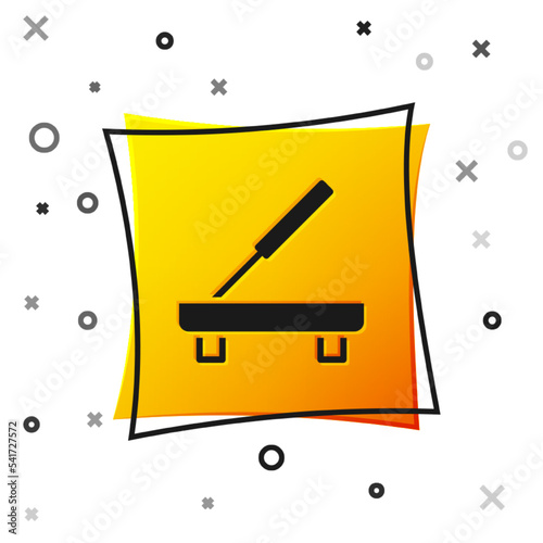 Black Scented spa stick on a wooden stand icon isolated on white background. Incense stick. Cosmetic procedure aromatherapy. Yellow square button. Vector