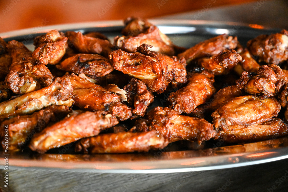 Chicken meat. Grilled chicken wings.