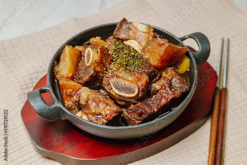 galbijjim, Korean Braised Short Ribs : Beef short ribs, trimmed of fat, seasoned in sweet soy sauce, and braised until tender with carrots, chestnuts, ginko nuts, and other vegetables. photo