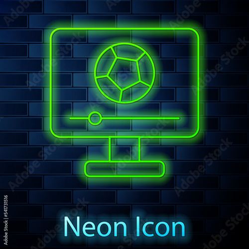 Glowing neon line Football soccer match on TV icon isolated on brick wall background. Football online concept. Vector