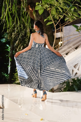 woman in natural dyed Javanese batik dress