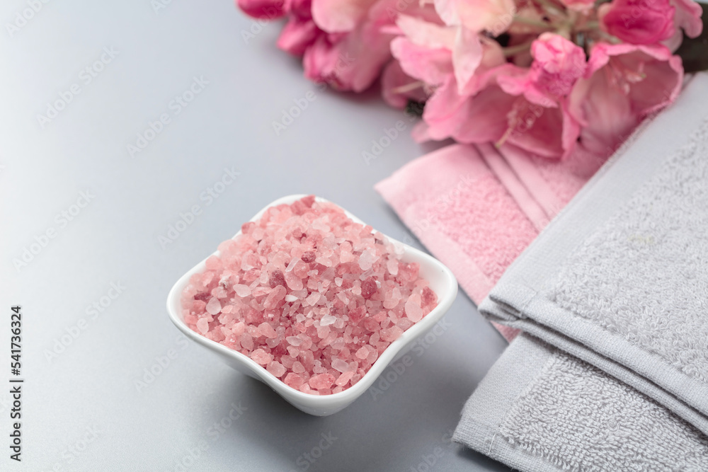Spa composition with pink Himalayan salt.