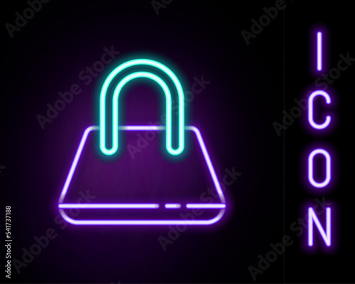 Glowing neon line Handbag icon isolated on black background. Female handbag sign. Glamour casual baggage symbol. Colorful outline concept. Vector
