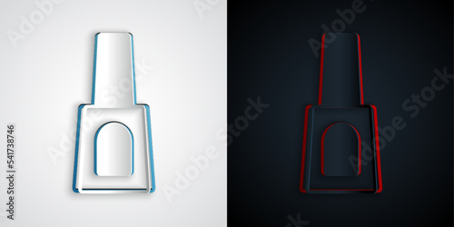 Paper cut Bottle of nail polish icon isolated on grey and black background. Paper art style. Vector