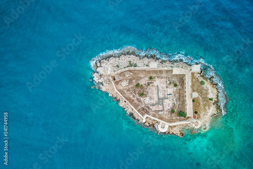 Looking up at the castle in the middle of the sea. drone shooting. Mersin kız kalesi