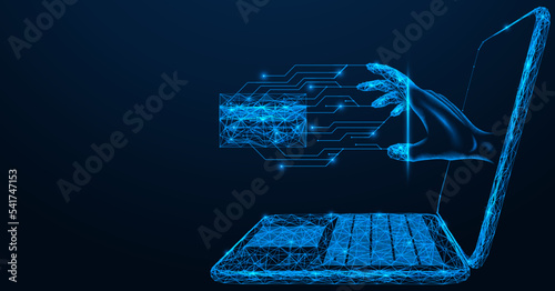 Hand from the laptop copies the information from the payment card. Polygonal design of interconnected lines and points. Blue background.