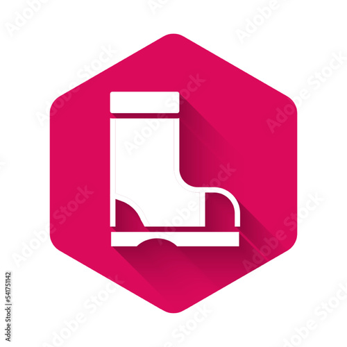 White Waterproof rubber boot icon isolated with long shadow background. Gumboots for rainy weather, fishing, gardening. Pink hexagon button. Vector