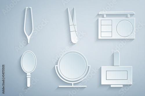 Set Round makeup mirror, Eye shadow palette, Hand, Nail polish bottle, Eyebrow tweezers and icon. Vector © vector_v