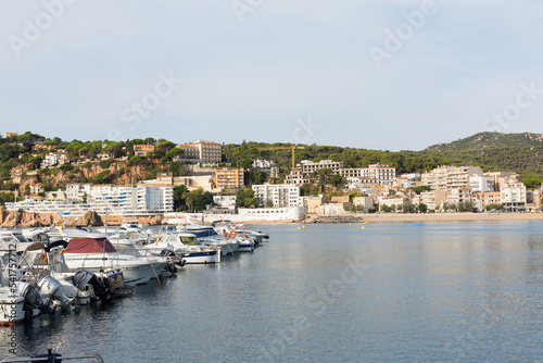Marina with small boats moored at the quay in Sant Feliu de Gixols  Catalonia  Spain