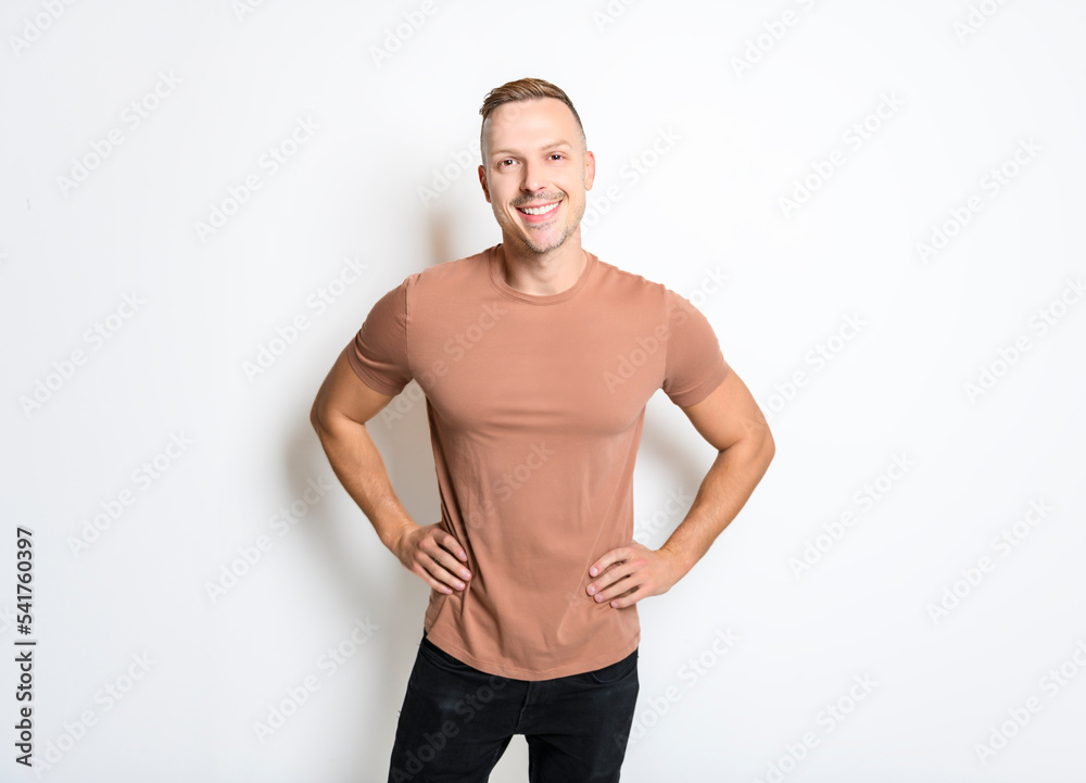 portrait of handsome young man. Cheerful men isolated on gray background studio shot
