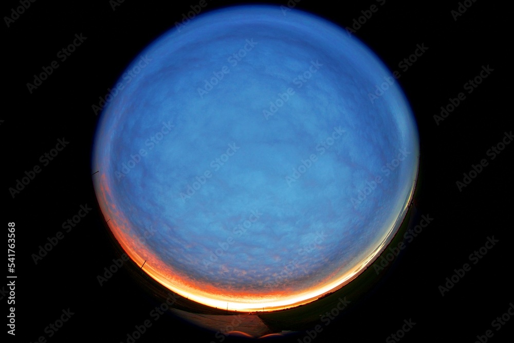 Obraz premium Sunset over rural scenery