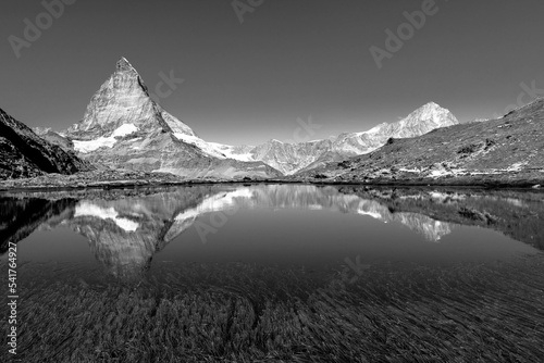 Iconic Matterhorn peak reflected in Stellisee Lake in Zermatt, Switzerland.