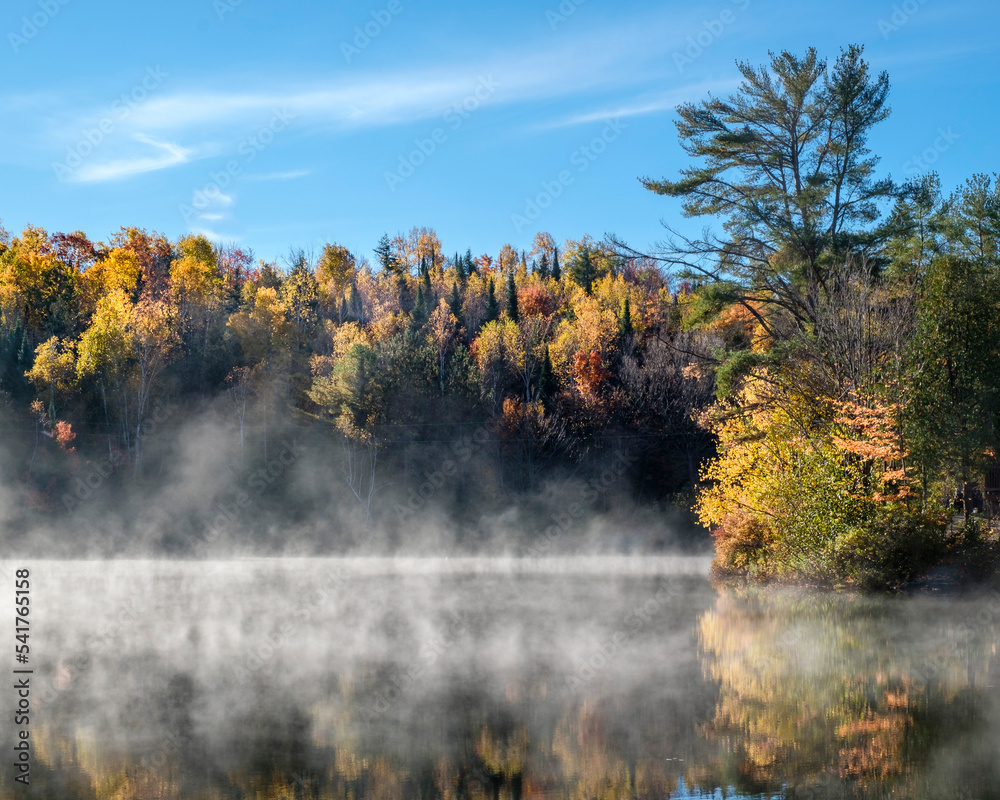 Morning mist on a small lake in northern Quebec.