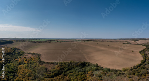 drone view of endless brown plowed agricultural fields on the Danubian Plain of Bulgaria