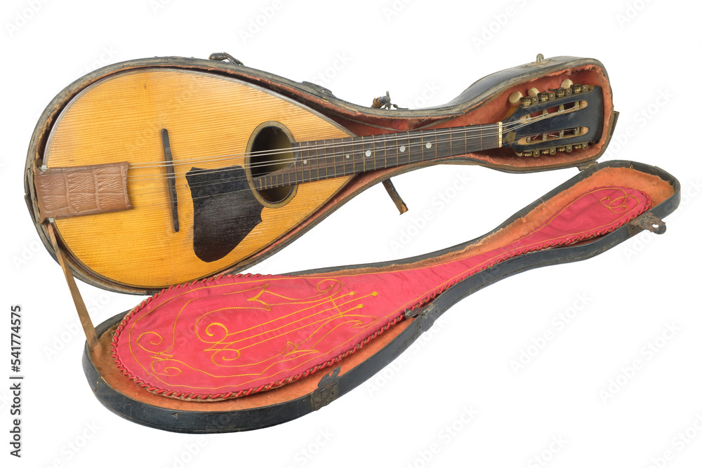 An old mandolin with case isolated on white background An old mandolin with case isolated on white background