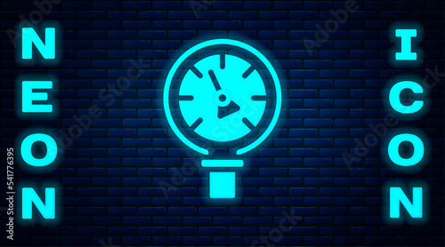 Glowing neon Pressure water meter icon isolated on brick wall background. Vector