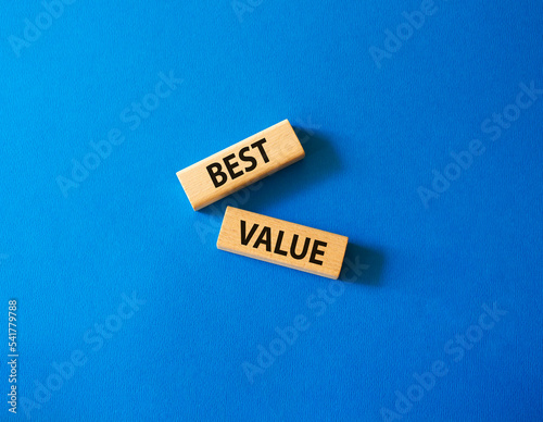 Best value symbol. Wooden blocks with words Best value. Beautiful blue background. Business and Best value concept. Copy space.