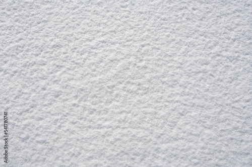 Snow texture for design. White texture. View from above .