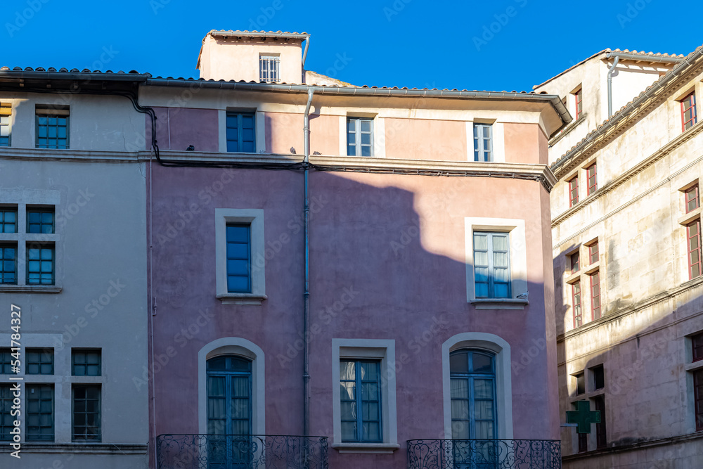 Nimes in France, old facades in the historic center, typical houses
