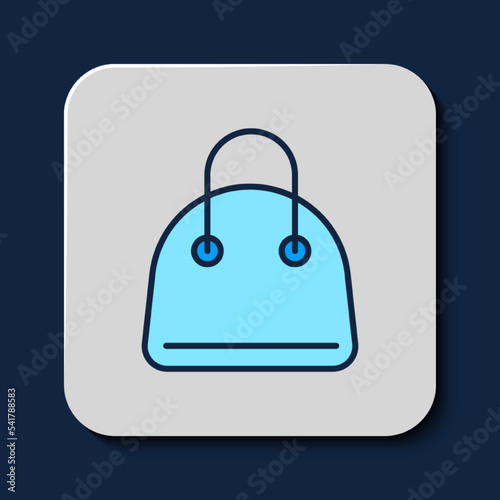 Filled outline Handbag icon isolated on blue background. Female handbag sign. Glamour casual baggage symbol. Vector