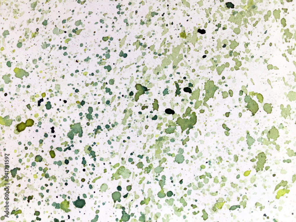 Watercolor small splashes of different shades of green on a white background Watercolor small splashes of different shades of green on a white background