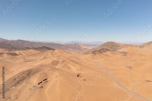 Aerial view of mountains and a road in the atacama desert near the city of Copiap  