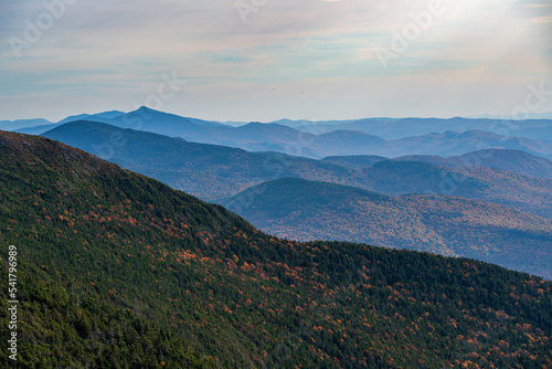 Receding summits of the Green Mountains to Camels Hump in the distance from Mount Mansfield