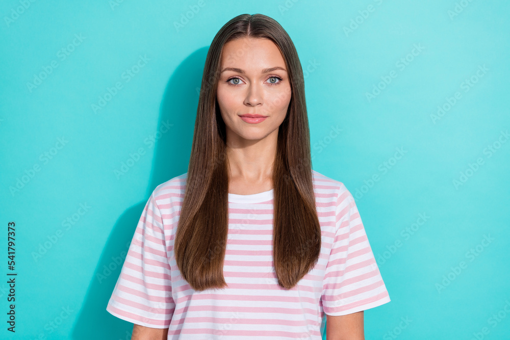 Obraz premium Photo of pretty gorgeous nice girl with straight hairdo dressed striped t-shirt confident look at camera isolated on teal color background