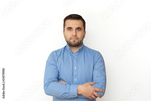 Caucasian adult man, with crossed arms portrait, isolated on white background