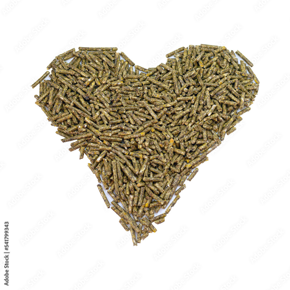 Heart - rabbit food fodder cereal isolated on white Heart - rabbit food fodder cereal isolated on white