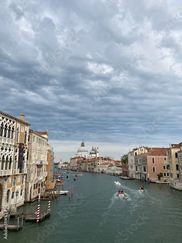 view of Maria della Salute from ponte dell Accademia with stormy sky, Venice, Italy