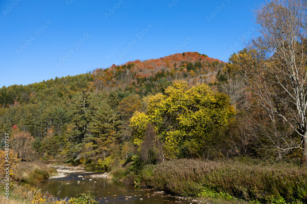 Autumn landscape with river is seen from Route 110, Vermont, USA Autumn landscape with river is seen from Route 110, Vermont, USA