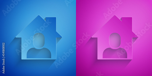 Paper cut Online working icon isolated on blue and purple background. Freelancer man working on laptop at his house. Remote work. Distant job concept. Paper art style. Vector
