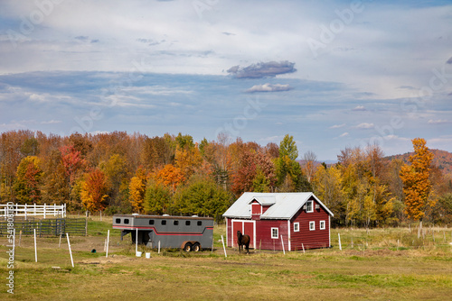 Farm with stable and trailer in autumn, Morristown, Vermont, USA