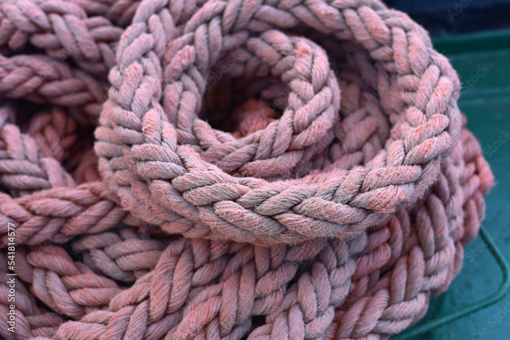 A rope folded in a circle on a ship