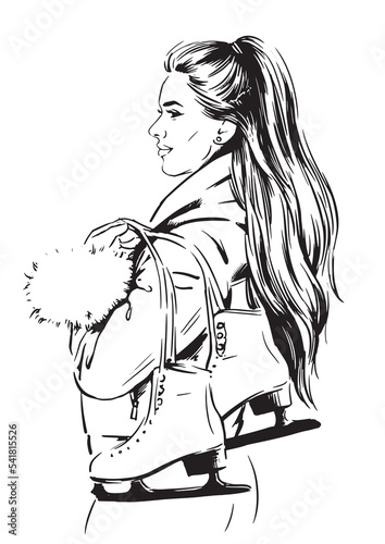 attractive woman holding ice skates